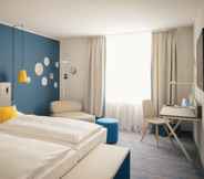 Bedroom 4 Vienna House Easy by Wyndham Wuppertal