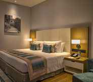 Kamar Tidur 4 The Gateway Hotel Ambad