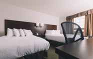 Kamar Tidur 3 Service Plus Inn and Suites - Grande Prairie