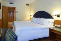 ห้องนอน Up Rooms Vic Hotel