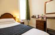 Kamar Tidur 6 Kensington Gardens Hotel