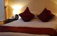 Kamar Tidur 4 Boars Head Hotel