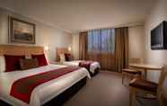 Kamar Tidur 5 Best Western Plus Travel Inn Hotel