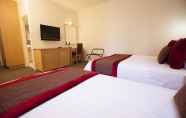 Kamar Tidur 3 Best Western Plus Travel Inn Hotel