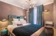 Kamar Tidur 2 Handsome Hotel by Elegancia