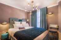 Kamar Tidur Handsome Hotel by Elegancia