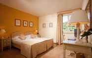 Bedroom 3 Parkhotel Villa Grazioli