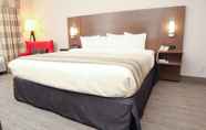 Bedroom 2 Country Inn & Suites by Radisson, Harlingen, TX
