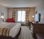 Bedroom 3 Country Inn & Suites by Radisson, Harlingen, TX