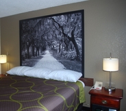 Bedroom 4 Super 8 by Wyndham Warner Robins