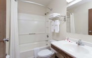 In-room Bathroom 3 Super 8 by Wyndham Lewiston Auburn Area