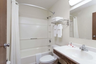 In-room Bathroom Super 8 by Wyndham Lewiston Auburn Area