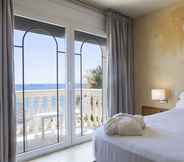Bedroom 2 Hotel URH Sitges Playa