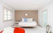 Kamar Tidur 5 Townhouse Hotel by LuxUrban, Trademark Collection by Wyndham