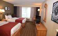 Bedroom 7 Port Wisconsin Inn and Suites