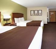 Bedroom 5 Cobblestone Hotel & Suites – Wisconsin Rapids