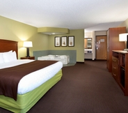 Bedroom 4 Cobblestone Hotel & Suites – Wisconsin Rapids