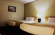 ห้องนอน 7 Econo Lodge Inn & Suites Central