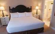 Bedroom 2 Charlevoix Inn & Suites SureStay Collection by Best Western