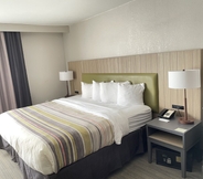 Kamar Tidur 3 Country Inn & Suites by Radisson, Greenville, NC