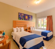 Bedroom 2 Decameron Los Cocos All Inclusive