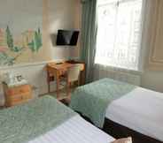 Kamar Tidur 4 Rushmore Hotel