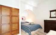 Bedroom 6 Nikos Villas Hotel in Oia Santorini