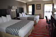 Kamar Tidur Travelodge Inn & Suites by Wyndham Norman