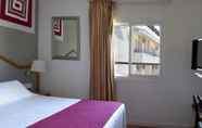 Phòng ngủ 7 Hotel Subur