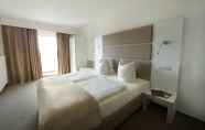 Kamar Tidur 2 Confour Hotel