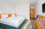 Bedroom 2 Courtyard by Marriott Dortmund