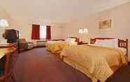 Kamar Tidur 4 Quaint Inn & Suites