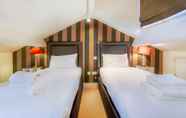 Kamar Tidur 2 Tophams Hotel