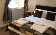 Kamar Tidur 3 The New County Hotel