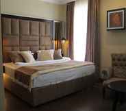 Bedroom 6 Ambassador Hotel Almaty