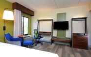 Bedroom 2 Holiday Inn Express & Suites Raleigh Durham Airport at RTP, an IHG Hotel