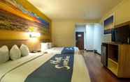 Bedroom 5 Days Inn & Suites by Wyndham Houston North/Aldine