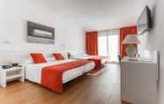 Kamar Tidur 3 Hotel Intur Orange