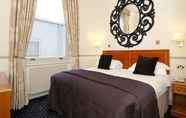 Kamar Tidur 7 Collingham Serviced Apartments