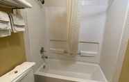 In-room Bathroom 5 Super 8 by Wyndham Van Buren/Ft. Smith Area