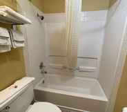 In-room Bathroom 5 Super 8 by Wyndham Van Buren/Ft. Smith Area