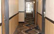 Lobby 4 Coratel Inn & Suites by Jasper Hastings