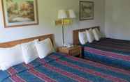 Bedroom 5 AmeriVu Inn and Suites - Stanley