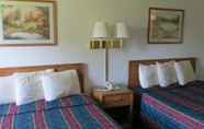 Bedroom 7 AmeriVu Inn and Suites - Stanley