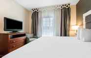 Bedroom 2 Erie Inn & Suites Solstice