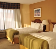 Bedroom 6 Oasis Inn & Suites Joshua Tree - 29 Palms