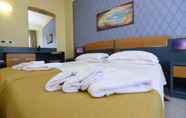 Kamar Tidur 2 Grand Hotel President