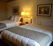 Bedroom 3 FairBridge Inn & Suites in Thorp, WI