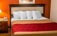 Bedroom 4 Economy Inn & Suites