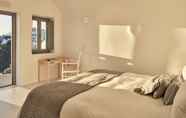 Bedroom 4 Katikies Chromata Santorini - The Leading Hotels of the World